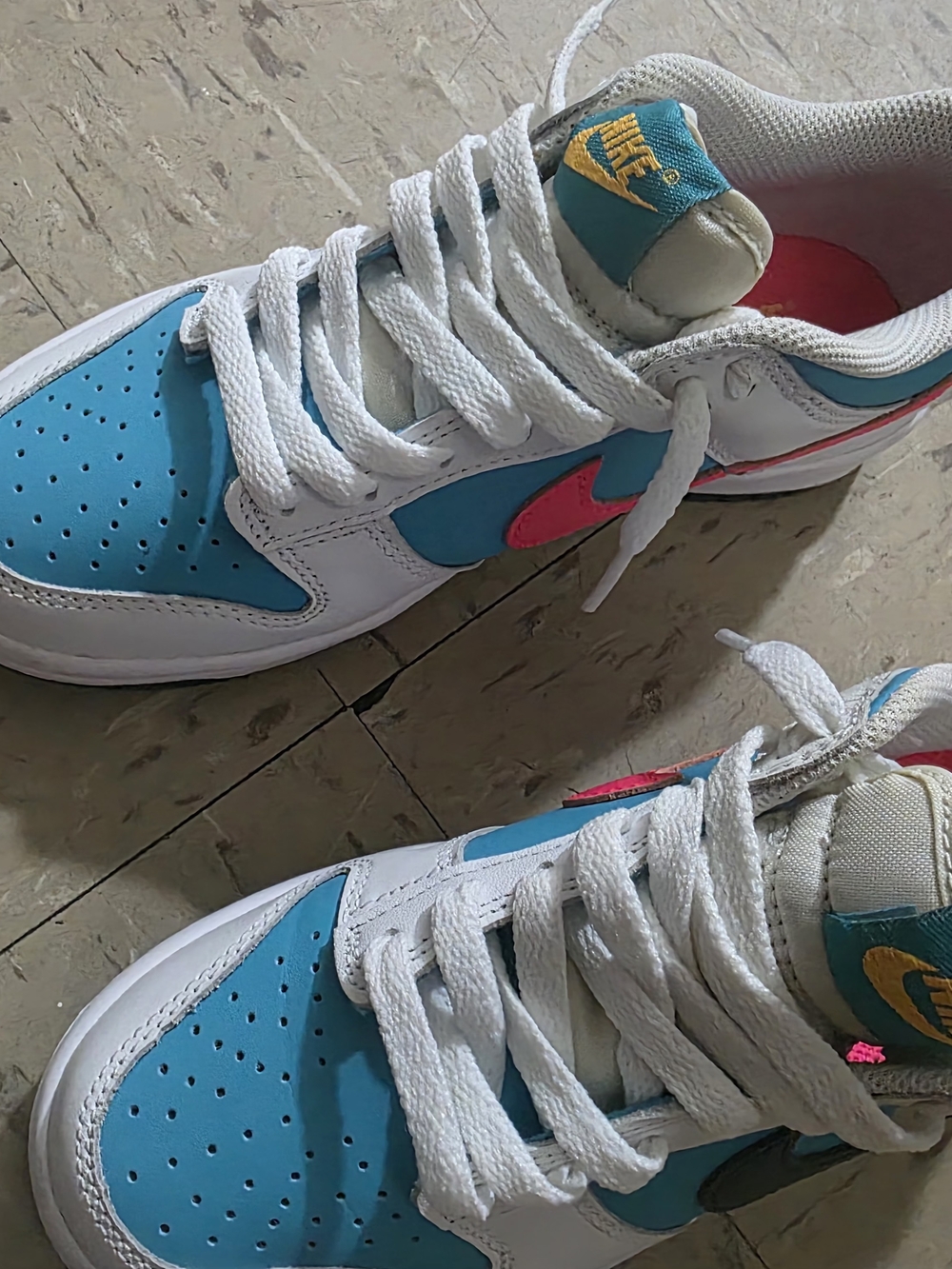 Nike Kids Low-Top Sneakers in Teal, Pink & White with Yellow Logo